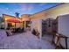 This custom outdoor shower features travertine and tile accents, with easy access from the pool and spa at 1423 E Beverly Ln, Phoenix, AZ 85022