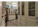 Spacious walk-in closet with custom shelving and ample storage at 1423 E Beverly Ln, Phoenix, AZ 85022