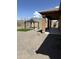 Backyard features a gazebo and covered patio at 1702 N 214Th Ln, Buckeye, AZ 85396