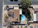 An aerial view of a single-Gathering home showing the swimming pool in the backyard at 1720 E Intrepid Ave, Mesa, AZ 85204