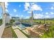 Outdoor space features a sparkling pool, pergola with grill, lounge chairs, and golf course views at 17396 W Crawfordsville Dr, Surprise, AZ 85388