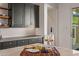 Close-up of a kitchen island with food and drinks at 17396 W Crawfordsville Dr, Surprise, AZ 85388