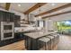 Modern kitchen featuring a large center island with seating at 17396 W Crawfordsville Dr, Surprise, AZ 85388