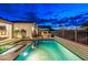 Inviting backyard pool area with a built-in grill, pergola, and decorative tile accents at 17396 W Crawfordsville Dr, Surprise, AZ 85388