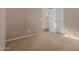 Spacious bedroom with neutral walls and carpet at 17517 W Dahlia Dr, Surprise, AZ 85388