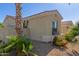 Side view of a single-story home highlighting the well-maintained exterior at 17517 W Dahlia Dr, Surprise, AZ 85388