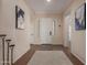 Open foyer with tile flooring and natural light flowing in at 17517 W Dahlia Dr, Surprise, AZ 85388