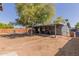 Large backyard features a covered patio perfect for outdoor entertaining or relaxing in privacy at 20816 E Duncan St, Queen Creek, AZ 85142
