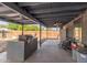 A spacious covered patio with an outdoor kitchen area perfect for entertaining and relaxing at 20816 E Duncan St, Queen Creek, AZ 85142