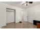 Bright bedroom has a closet, tiled floor and fresh paint, offering a clean and inviting space at 20816 E Duncan St, Queen Creek, AZ 85142