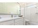 Modern bathroom featuring a glass-enclosed shower, bright lighting, and a stylish vanity at 23871 N 167Th Ln, Surprise, AZ 85387