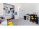 A tidy bedroom features a closet with organizing systems and space for activities at 23871 N 167Th Ln, Surprise, AZ 85387