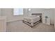 Cozy bedroom with a neutral color scheme, plush carpeting, and a comfortable bed at 23871 N 167Th Ln, Surprise, AZ 85387