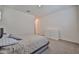 Comfortable bedroom features a neutral color scheme, plush carpeting, and natural light at 23871 N 167Th Ln, Surprise, AZ 85387