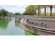 Beautiful entrance to the community featuring lovely landscaping and water features at 23871 N 167Th Ln, Surprise, AZ 85387