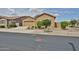 Well-maintained single-story home with two-car garage and desert-friendly landscaping at 23871 N 167Th Ln, Surprise, AZ 85387