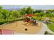 Fun community playground with a variety of play equipment and shaded seating at 23871 N 167Th Ln, Surprise, AZ 85387