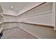 Spacious walk-in closet with ample shelving, providing plenty of storage space at 23871 N 167Th Ln, Surprise, AZ 85387