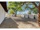 Large backyard features rock landscaping, offering ample space for outdoor activities at 250 E Barbarita Ave, Gilbert, AZ 85234
