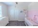 Cozy Bedroom featuring a crib, dresser, and soft carpeting for a comfortable atmosphere at 25202 N 142Nd Dr, Surprise, AZ 85387