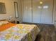 Cozy bedroom setup with matching bedside tables and lamps at 2602 W Berridge Ln # C102, Phoenix, AZ 85017