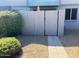Exterior view of home featuring a private courtyard with a privacy fence and desert landscaping at 2602 W Berridge Ln # C102, Phoenix, AZ 85017