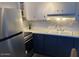 Well-lit kitchen featuring modern countertops and stainless steel refrigerator at 2602 W Berridge Ln # C102, Phoenix, AZ 85017