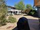 Outdoor space featuring a covered grill and landscaping at 2602 W Berridge Ln # C102, Phoenix, AZ 85017