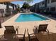 Relaxing pool area with comfortable lounge chairs perfect for enjoying sunny days at this lovely property at 2602 W Berridge Ln # C102, Phoenix, AZ 85017
