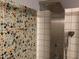 Shower stall featuring mosaic tile at 2602 W Berridge Ln # C102, Phoenix, AZ 85017