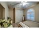 Inviting bedroom featuring plush carpeting, a ceiling fan, shuttered windows, and a spacious closet at 269 E Horseshoe Dr, Chandler, AZ 85249