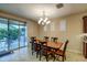 Cozy dining room with sliding glass door to the outdoor living space, perfect for al fresco dining at 269 E Horseshoe Dr, Chandler, AZ 85249
