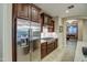 Modern kitchen with stainless steel appliances and dark wood cabinetry at 269 E Horseshoe Dr, Chandler, AZ 85249