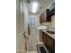 Functional laundry room featuring modern appliances, ample storage, and neutral tones creating a clean and efficient space at 269 E Horseshoe Dr, Chandler, AZ 85249