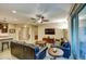 Spacious living room with a partial view of the kitchen and access to the patio at 269 E Horseshoe Dr, Chandler, AZ 85249