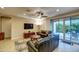 Inviting living room with a ceiling fan, patio access, and a cozy seating area at 269 E Horseshoe Dr, Chandler, AZ 85249