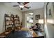 Well-lit office space with a classic desk, shelving, and a cozy armchair, offering a productive atmosphere at 269 E Horseshoe Dr, Chandler, AZ 85249