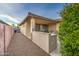A covered patio with outdoor grill, seating, and low maintenance gravel landscaping at 269 E Horseshoe Dr, Chandler, AZ 85249