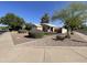 Charming single-story home featuring desert landscaping and a well-maintained front yard at 2735 E Harwell Rd, Gilbert, AZ 85234