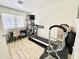 Workout room featuring a treadmill, desk, and Pilates machine at 2735 E Harwell Rd, Gilbert, AZ 85234