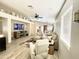 Open-concept living room with stylish furnishings, a ceiling fan, and ample natural light at 2735 E Harwell Rd, Gilbert, AZ 85234