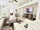 Comfortable living room with a modern entertainment center and stylish decor at 2735 E Harwell Rd, Gilbert, AZ 85234