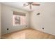 Bedroom featuring wood floors, bright light and neutral paint at 288 E Baylor Ln, Gilbert, AZ 85296