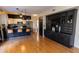 View of a built-in bar between the kitchen and open area at 288 E Baylor Ln, Gilbert, AZ 85296