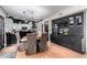Elegant dining area adjacent to kitchen features stylish furniture and ample natural light at 288 E Baylor Ln, Gilbert, AZ 85296
