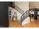 Inviting interior view showcases staircase, living room, and views to kitchen at 288 E Baylor Ln, Gilbert, AZ 85296