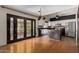 Modern kitchen with stainless steel appliances, granite counters and access to patio at 288 E Baylor Ln, Gilbert, AZ 85296