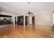 Open floor plan features wood floors and bright light throughout the home at 288 E Baylor Ln, Gilbert, AZ 85296