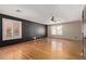 Living room featuring bright light, modern paint and wood floors throughout at 288 E Baylor Ln, Gilbert, AZ 85296