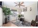Bright home office space featuring a ceiling fan, large window, a desk, and natural light, and decorative accents at 288 E Baylor Ln, Gilbert, AZ 85296